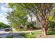 Charming two-story home with a covered front porch, manicured lawn, and mature shade trees at 161 Fort Jackson Rd, Morrisville, NC 27560