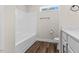 Clean bathroom with white tub, shower, and sink with quartz countertops at 166 Old Field Loop Loop, Sanford, NC 27332