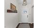 Bright entryway with a coat rack and a view of the front door at 166 Old Field Loop Loop, Sanford, NC 27332