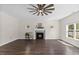 Spacious living room with a fireplace and dark hardwood floors at 166 Old Field Loop Loop, Sanford, NC 27332