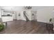 Open-concept living room with hardwood floors and staircase at 166 Old Field Loop Loop, Sanford, NC 27332