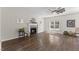 Spacious living room with a fireplace and dark hardwood floors at 166 Old Field Loop Loop, Sanford, NC 27332