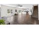 Open-concept living room with hardwood floors and staircase at 166 Old Field Loop Loop, Sanford, NC 27332