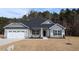 Charming single-story home with gray siding, black shutters, and a well-manicured lawn at 1681 Pecan Drive # 24, Nashville, NC 27856