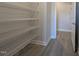 Walk-in pantry with wire shelving, providing ample storage space in the new home at 1681 Pecan Drive # 24, Nashville, NC 27856