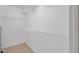 Walk-in closet with white wire shelving at 175 Bill Avery Rd, Coats, NC 27521