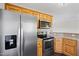 Kitchen features include stainless steel appliances and wood cabinets at 175 Bill Avery Rd, Coats, NC 27521