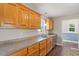 Features include a stainless steel dishwasher, wood flooring, and wood cabinets at 175 Bill Avery Rd, Coats, NC 27521