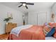 Comfortable bedroom featuring wood floors, closet, and neutral colors at 1804 N Alston Ave, Durham, NC 27701