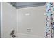 Close-up of tiled shower with shower head and installed soap dish at 1804 N Alston Ave, Durham, NC 27701