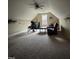 Expansive attic space with carpet and a ceiling fan at 194 Wood Valley Dr, Four Oaks, NC 27524