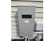 Honeywell electrical box on the exterior of a home, with emergency disconnect switch at 194 Wood Valley Dr, Four Oaks, NC 27524