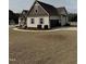 Charming home with a two-car garage, manicured bushes, and a well-kept lawn at 194 Wood Valley Dr, Four Oaks, NC 27524