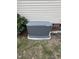 Exterior view of generator near a green bush at 194 Wood Valley Dr, Four Oaks, NC 27524