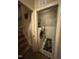 Well-maintained laundry room with washer, dryer, and ample storage space at 194 Wood Valley Dr, Four Oaks, NC 27524