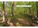 This lot offers space and privacy for a proposed Yurt/ADU site amidst a wooded area at 195 Nicks W Bnd, Pittsboro, NC 27312