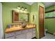 Bright bathroom with custom ceramic sink and colorful tiled countertop at 195 Nicks W Bnd, Pittsboro, NC 27312