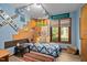 Whimsical bedroom featuring quirky decor, natural light from window, and a cozy daybed at 195 Nicks W Bnd, Pittsboro, NC 27312