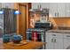 Modern kitchen featuring stainless steel appliances, granite countertops, and ample cabinet space at 195 Nicks W Bnd, Pittsboro, NC 27312