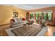 Inviting living room featuring comfortable seating, large windows, and a cozy atmosphere at 195 Nicks W Bnd, Pittsboro, NC 27312