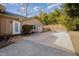 Spacious backyard featuring a large concrete patio and wooden fence for added privacy at 2009 Mallard Ln, Raleigh, NC 27609