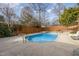 Inviting in-ground pool with a well-maintained concrete patio, perfect for summer relaxation at 2009 Mallard Ln, Raleigh, NC 27609