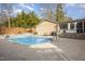 Backyard swimming pool and patio area with outdoor seating, perfect for relaxing and entertaining at 2009 Mallard Ln, Raleigh, NC 27609