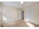 Spacious bedroom with carpet, featuring a closet and entrance to the next room at 2009 Mallard Ln, Raleigh, NC 27609