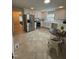 Bright kitchen featuring white cabinets, stainless appliances, and eat-in space at 2009 Mallard Ln, Raleigh, NC 27609