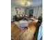 Spacious living room with hardwood floors, stylish furnishings, and ample natural light at 2009 Mallard Ln, Raleigh, NC 27609