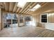 Enclosed sunroom with wood floors, skylights, and a ceiling fan at 2009 Mallard Ln, Raleigh, NC 27609