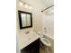 Cozy bathroom features a modern sink and vanity, toilet, and shower-tub combo with black hardware accents at 201 Lexington Park Dr, Oxford, NC 27565