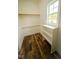 Bright closet features custom wood flooring, wood trim, and functional shelving perfect for organization at 201 Lexington Park Dr, Oxford, NC 27565