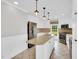 Modern kitchen with stainless steel appliances and a large island with granite countertops at 201 Wendy Pl, Benson, NC 27504