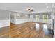 Spacious living room featuring hardwood floors, a fireplace, and neutral paint at 201 Wendy Pl, Benson, NC 27504