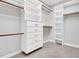 Organized walk-in closet featuring custom shelving, drawers, and ample storage space at 201 Wendy Pl, Benson, NC 27504