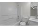 Well-maintained bathroom features a tub, shower, and vanity with a white countertop at 206 Black Bird Ct, Cary, NC 27511