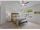 Cozy bedroom with large window, neutral color scheme, and stylish furnishings at 206 Black Bird Ct, Cary, NC 27511