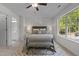Bright bedroom offers a large window, neutral colors, and ample space at 206 Black Bird Ct, Cary, NC 27511
