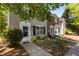 Charming townhouse with inviting entrance, featuring a well-manicured lawn and cozy front garden at 206 Black Bird Ct, Cary, NC 27511