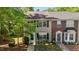 Charming two-story townhome with a well-maintained lawn and inviting front entrance at 206 Black Bird Ct, Cary, NC 27511