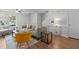 Comfortable living room with hardwood floors, a stylish sofa, and a cozy atmosphere at 206 Black Bird Ct, Cary, NC 27511