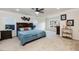 Spacious main bedroom featuring a ceiling fan, neutral-toned walls, and large windows allowing for lots of natural light at 2221 Holtwood Way, Apex, NC 27523