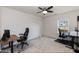 Spacious office with wood desk, ergonomic chairs, and ideal home workspace at 2221 Holtwood Way, Apex, NC 27523