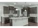 Updated kitchen featuring stainless steel appliances and granite countertops at 2227 Rocky Bay Ct, Cary, NC 27519