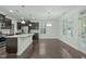 Gourmet kitchen with stainless steel appliances, granite counters and a spacious breakfast area at 2227 Rocky Bay Ct, Cary, NC 27519