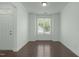 This room offers hardwood floors, a large window bringing in plenty of natural light and neutral-colored walls at 2227 Rocky Bay Ct, Cary, NC 27519
