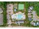 Aerial view of community amenities including pool, tennis courts, and playground at 225 Mayfield Dr, Apex, NC 27539
