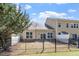 Fenced backyard with a patio offers privacy and space for outdoor enjoyment at 225 Mayfield Dr, Apex, NC 27539
