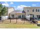 Lush backyard offers serene views and ample space for relaxation and activities at 225 Mayfield Dr, Apex, NC 27539